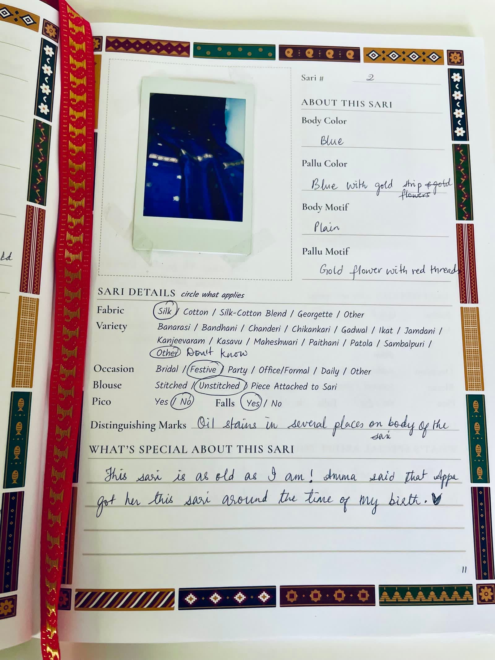 A filled page for a blue silk sari with gold border, marked festive